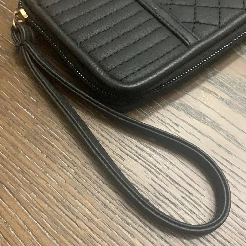 Unbranded black with black brads wristlets